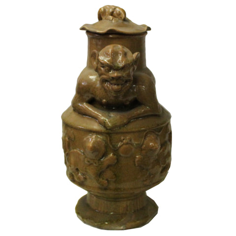 Yellow Brown Ceremonial Jar with Relief Monster Motif