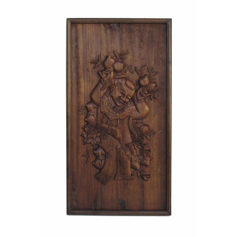 antique carved panel - kid holding longevity peach
