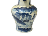 Aesthetic blue and white porcelain vase with rustic charm
