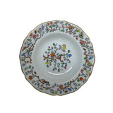 Scalloped edge porcelain plate