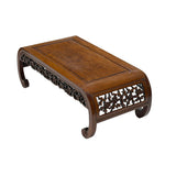Exotic hand-carved wood tea table with scroll feet