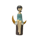 artistic ceramic figure - girl sitting on the moon figure