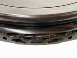 carved wood stand
