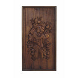 antique carved panel - kid holding longevity peach