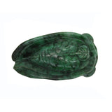 dark green cicada statue