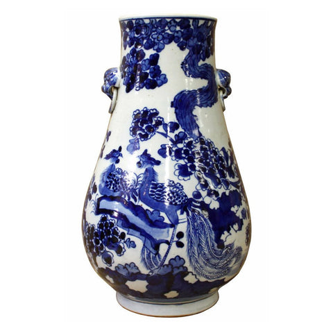 blue and white porcelain vase with house painting