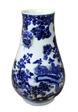 blue and white porcelain vase with house painting