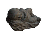 stone carving sleeping baby statue