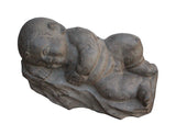 stone carving sleeping baby statue