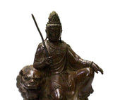 bronze Kwan Yin on lion - Bodhisattva -  goddess of mercy - goddess of compassion