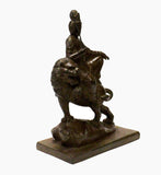 bronze Kwan Yin on lion - Bodhisattva -  goddess of mercy - goddess of compassion