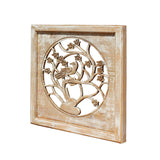 carved wood panel with bird and tree