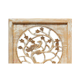 carved wood panel with bird and tree