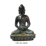 metal Buddha statue on lotus base