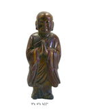 wood monk statue