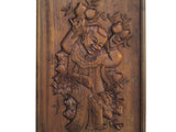 antique carved panel - kid holding longevity peach