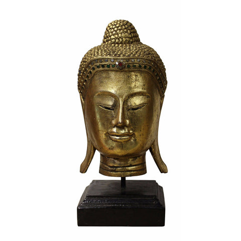 gold color Buddha head