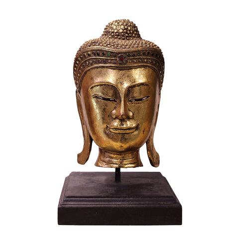 gold color Buddha head
