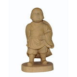 wood monk statue