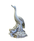 Asian porcelain turtle statue